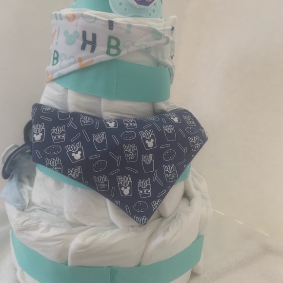 New Mickey Mouse diaper cake.50 diapers, 3 bibs, 2pair of socks 3 pacifiers - Picture 8 of 12